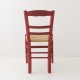 Chaise en paille rouge de dos